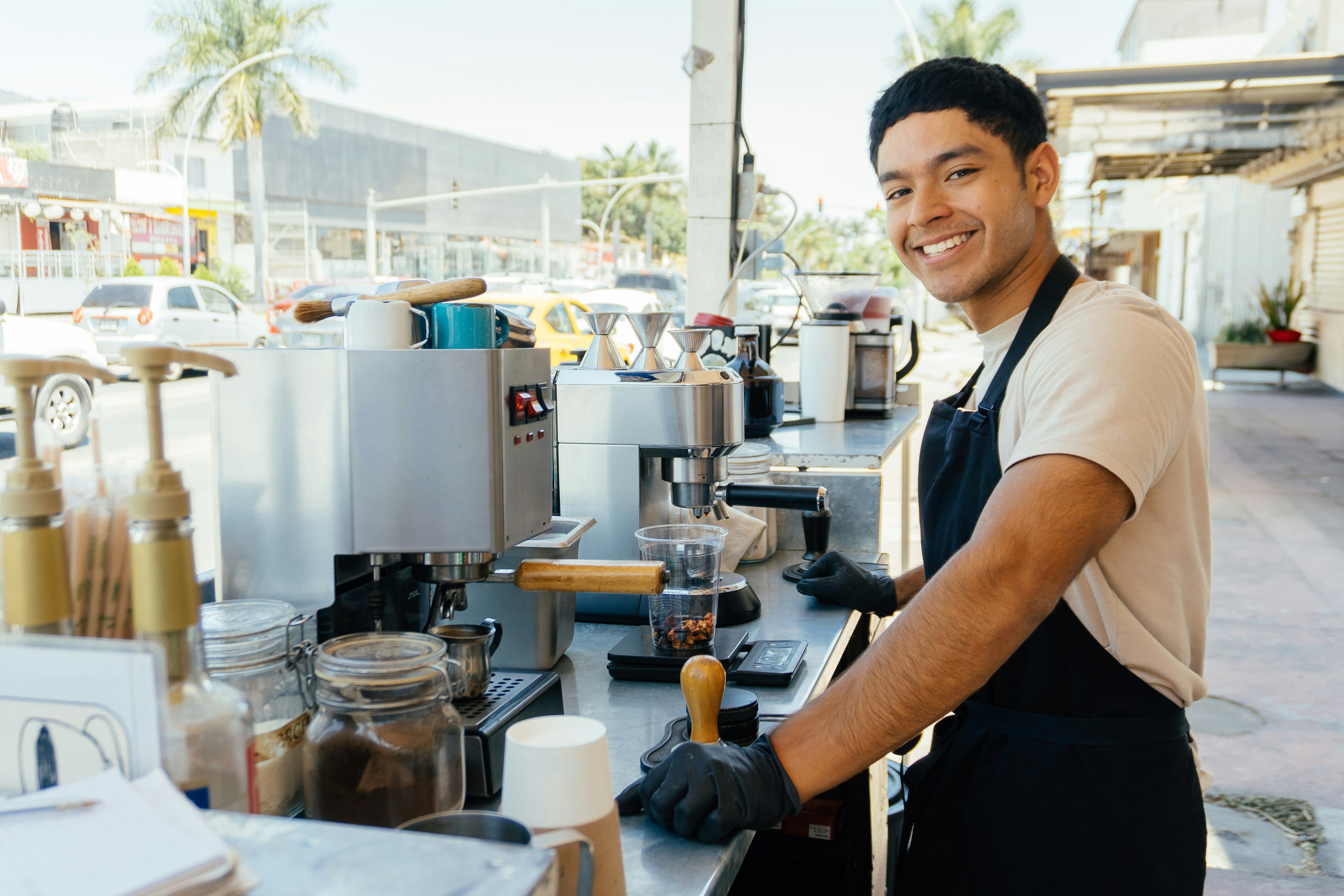 Worker making coffee