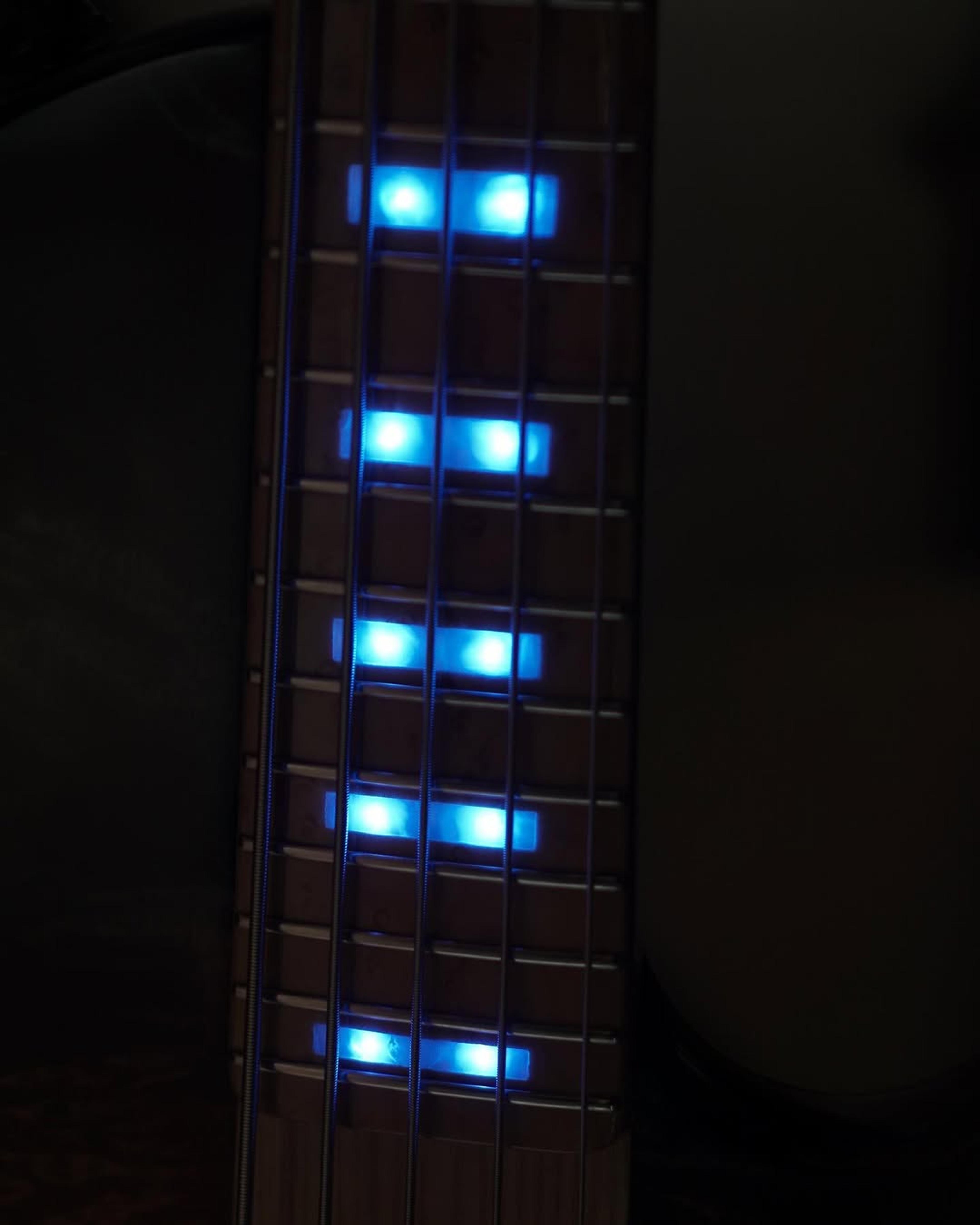 Front detail fretboard view of the ODIENG Nebula 5 string bass