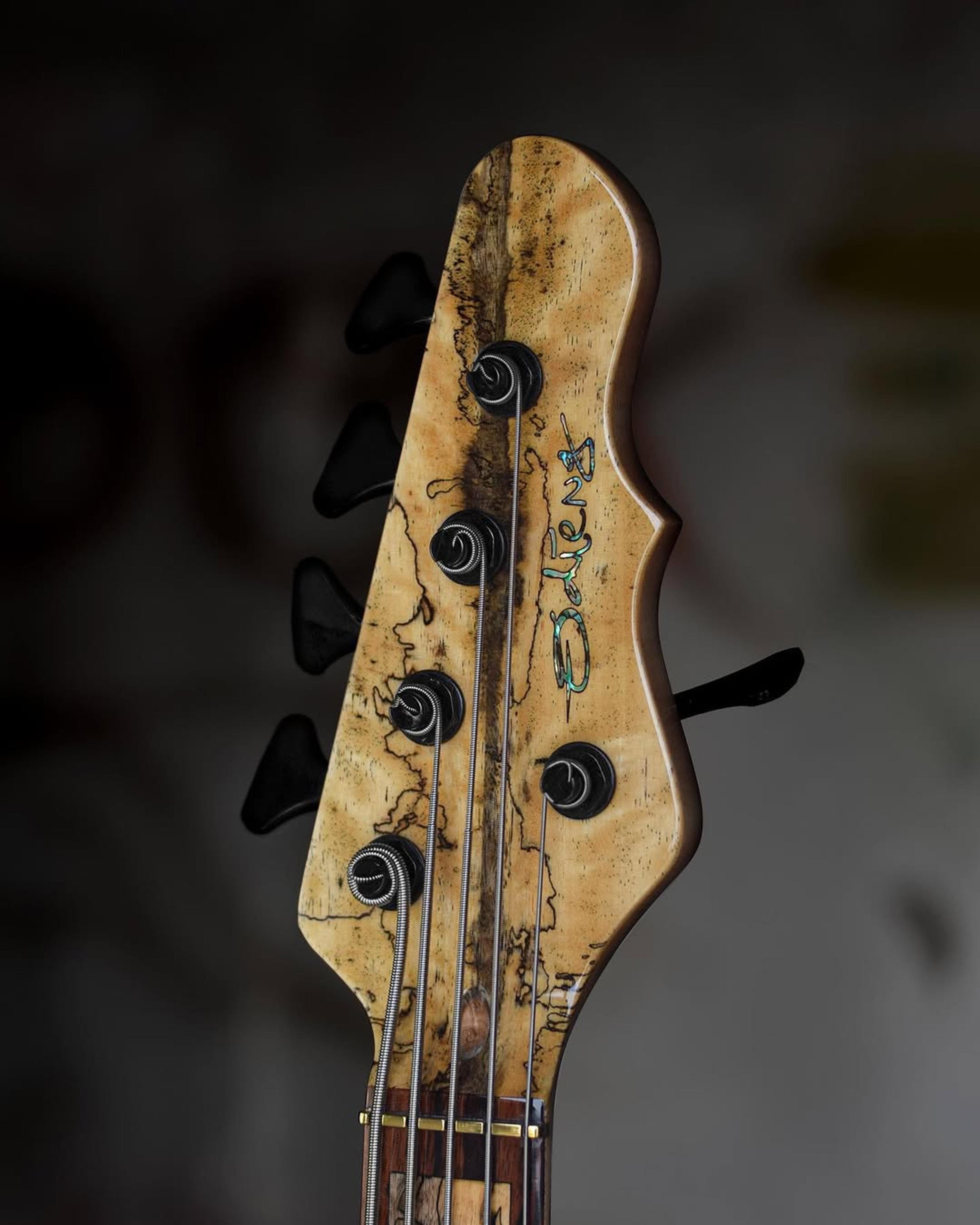 Front Headstock view of the ODIENG Corvette 5 string bass