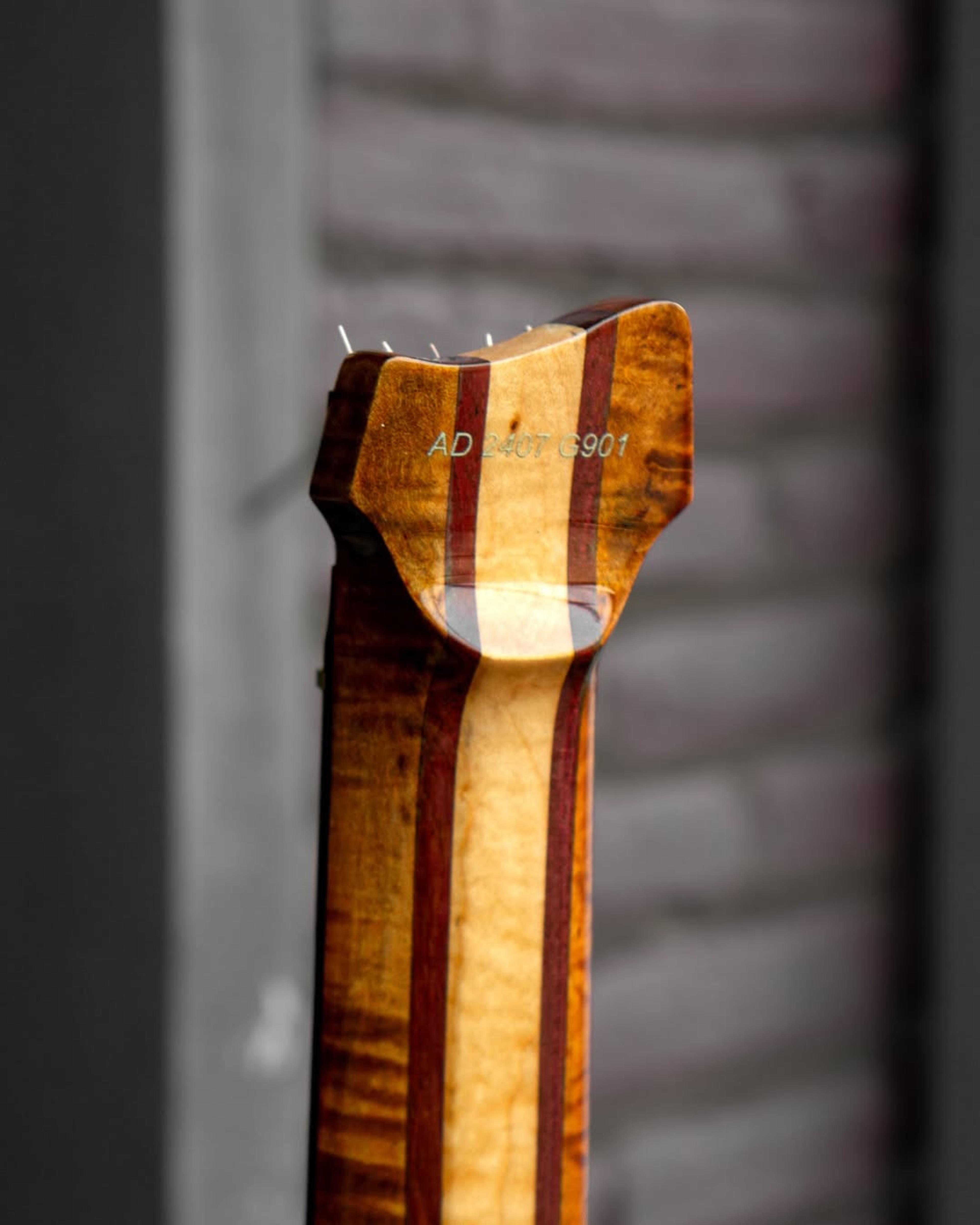 Back Headstock view of the ODIENG PA-HL Healess 6 String Guitar
