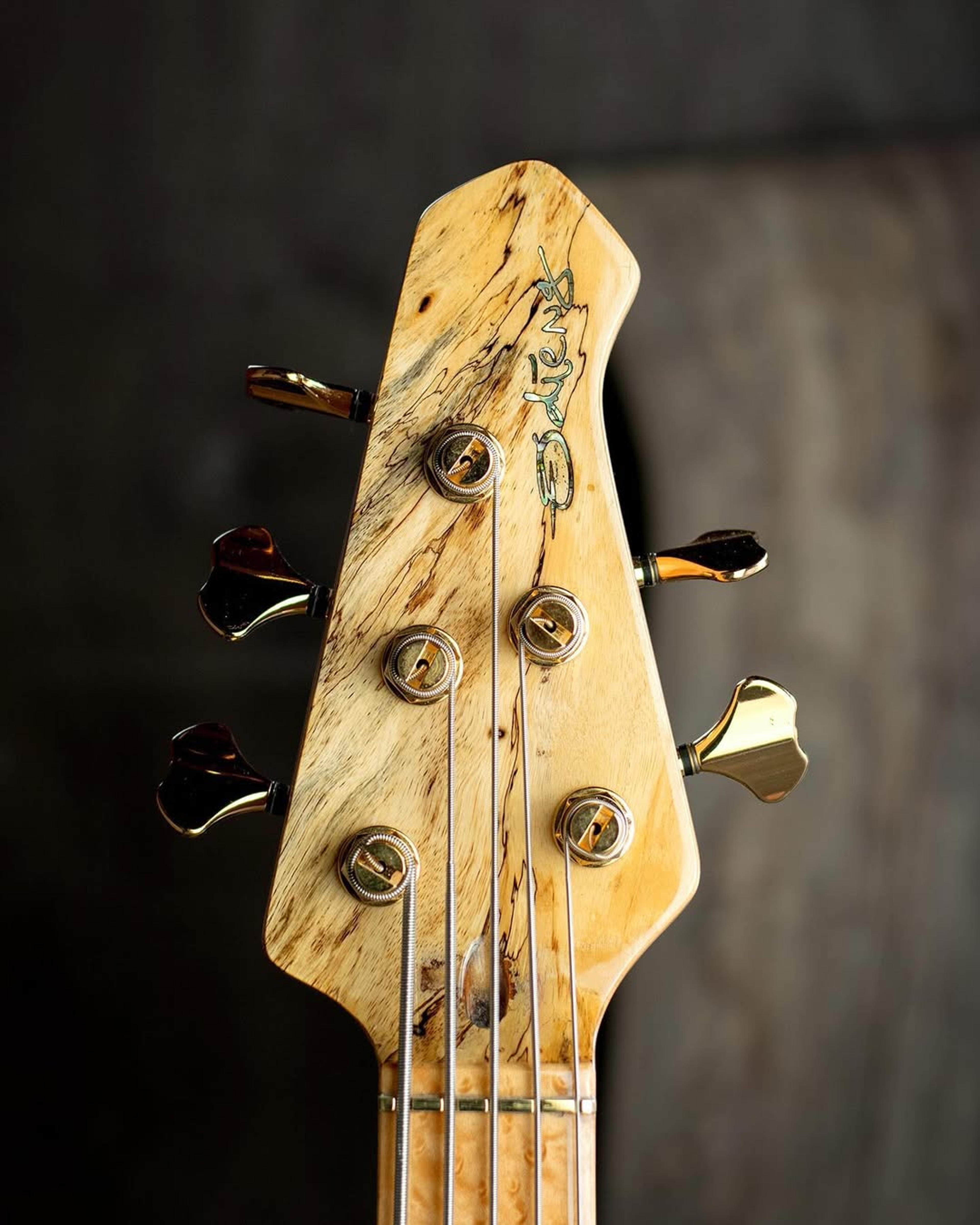 Front Headstock view of the ODIENG Nebula 5 string bass