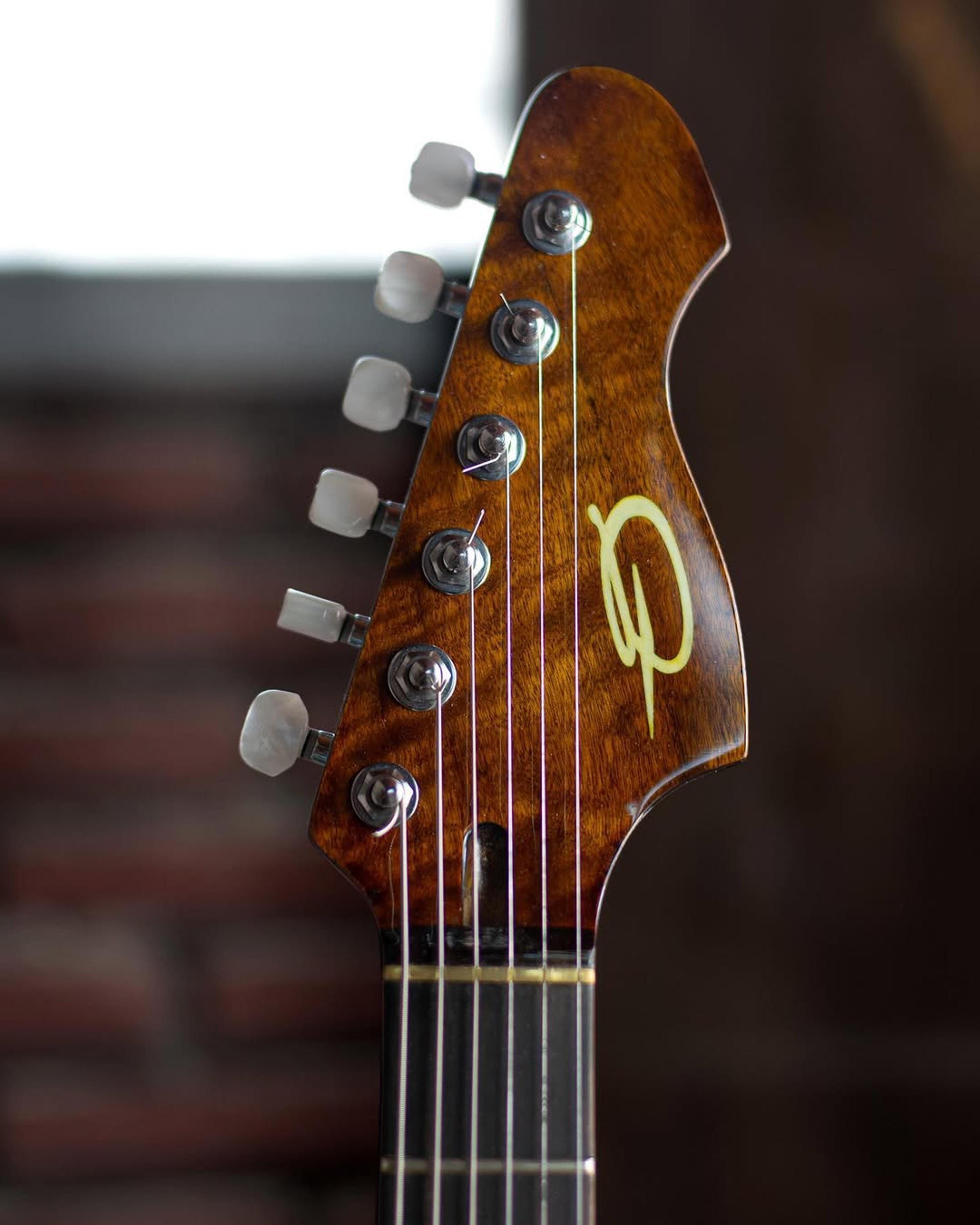 Front Headstock view of the ODIENG EF Series 2 6 string guitar