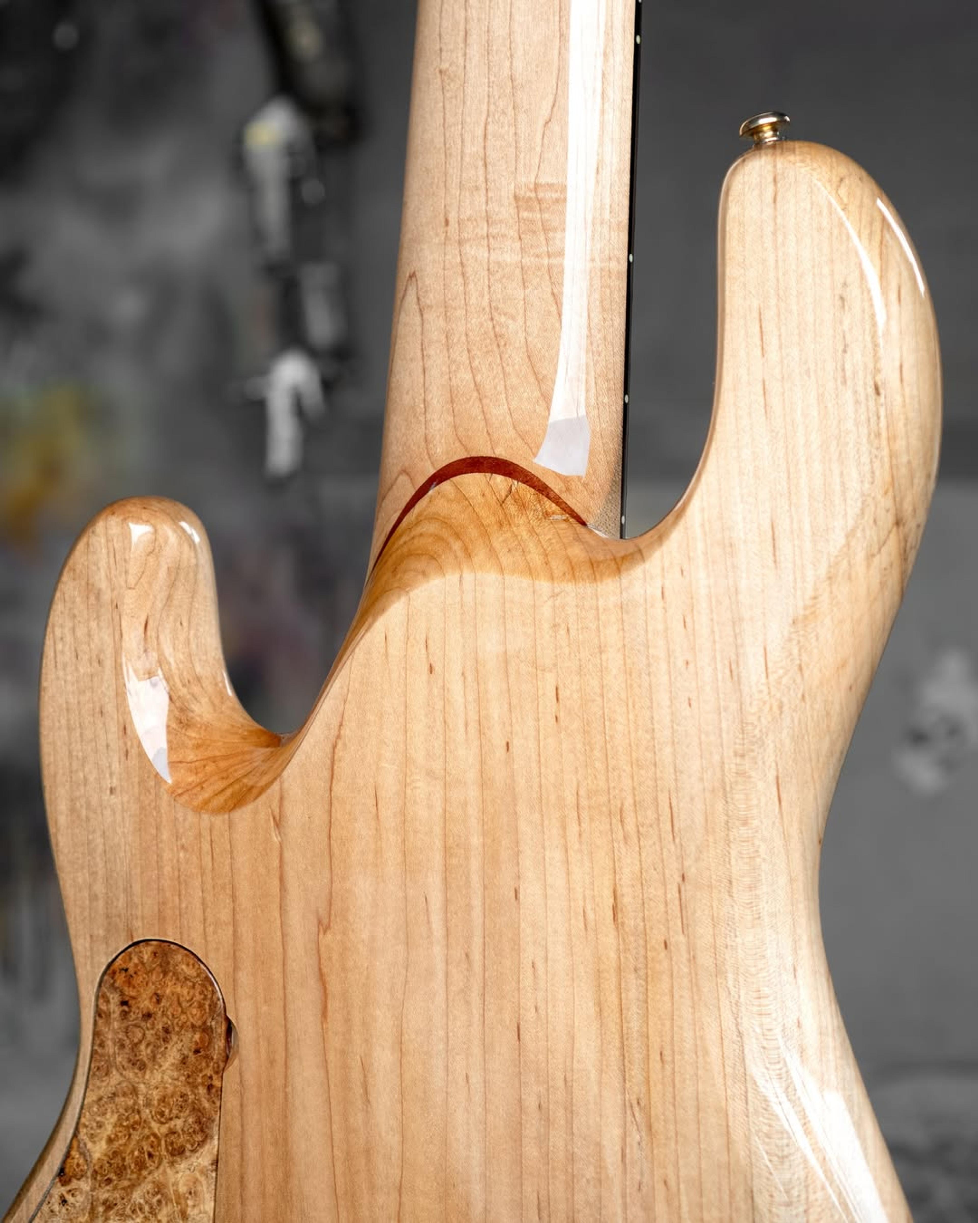 Back detail fretboard view of the ODIENG KJ 6 string bass
