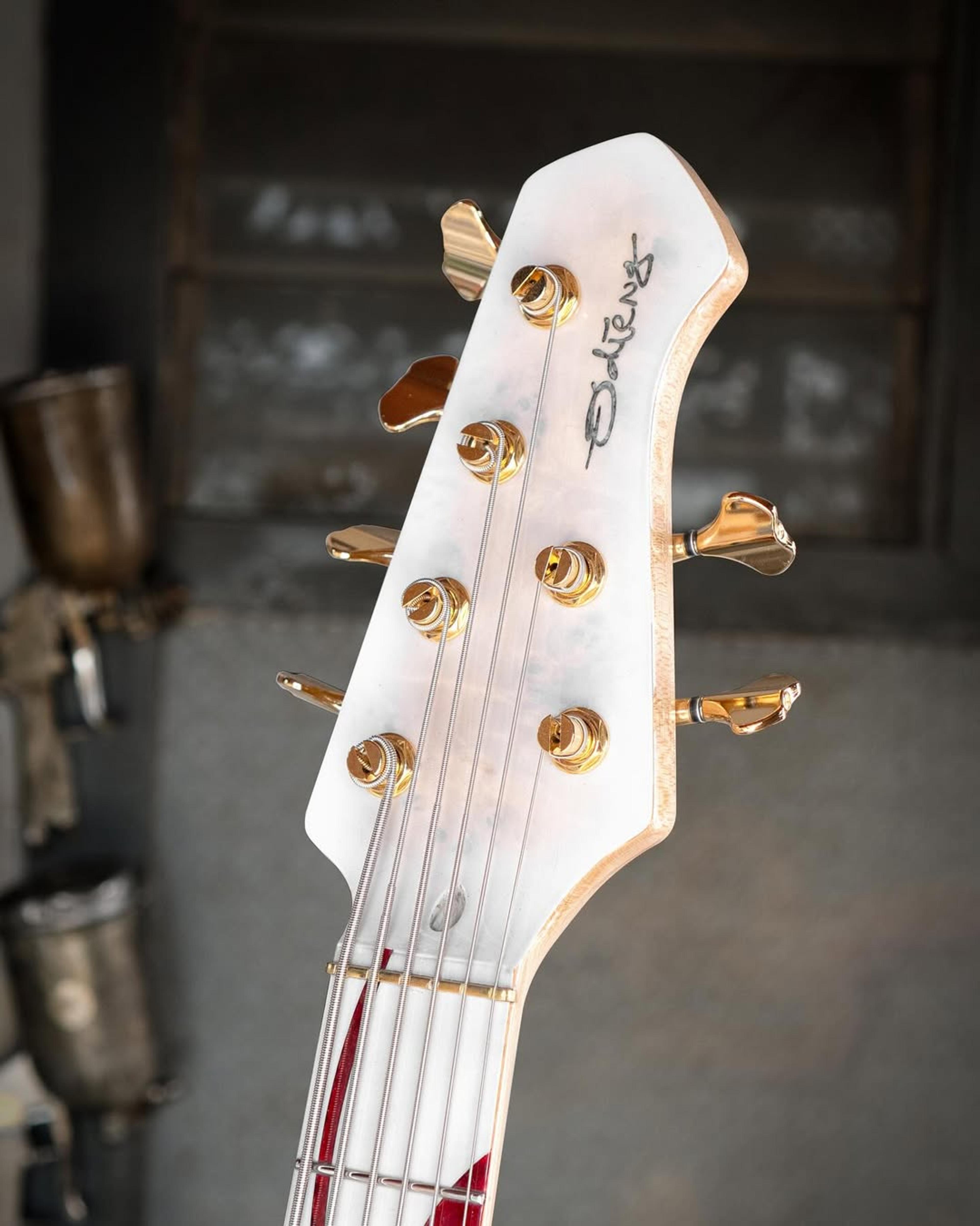 Front Headstock view of the ODIENG JC'82 V3 Signature 6 string bass