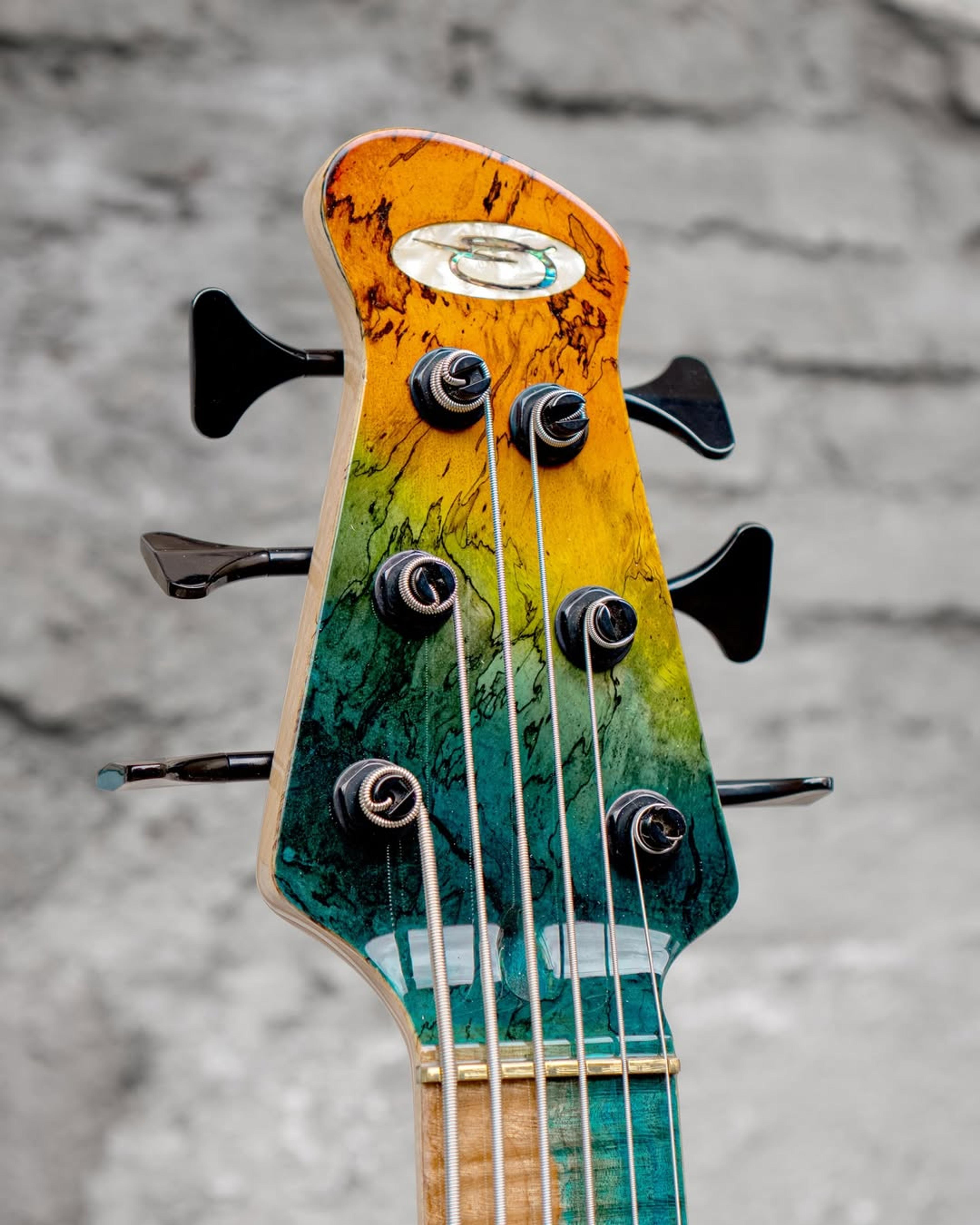 Front Headstock view of the ODIENG XJB 6 string bass