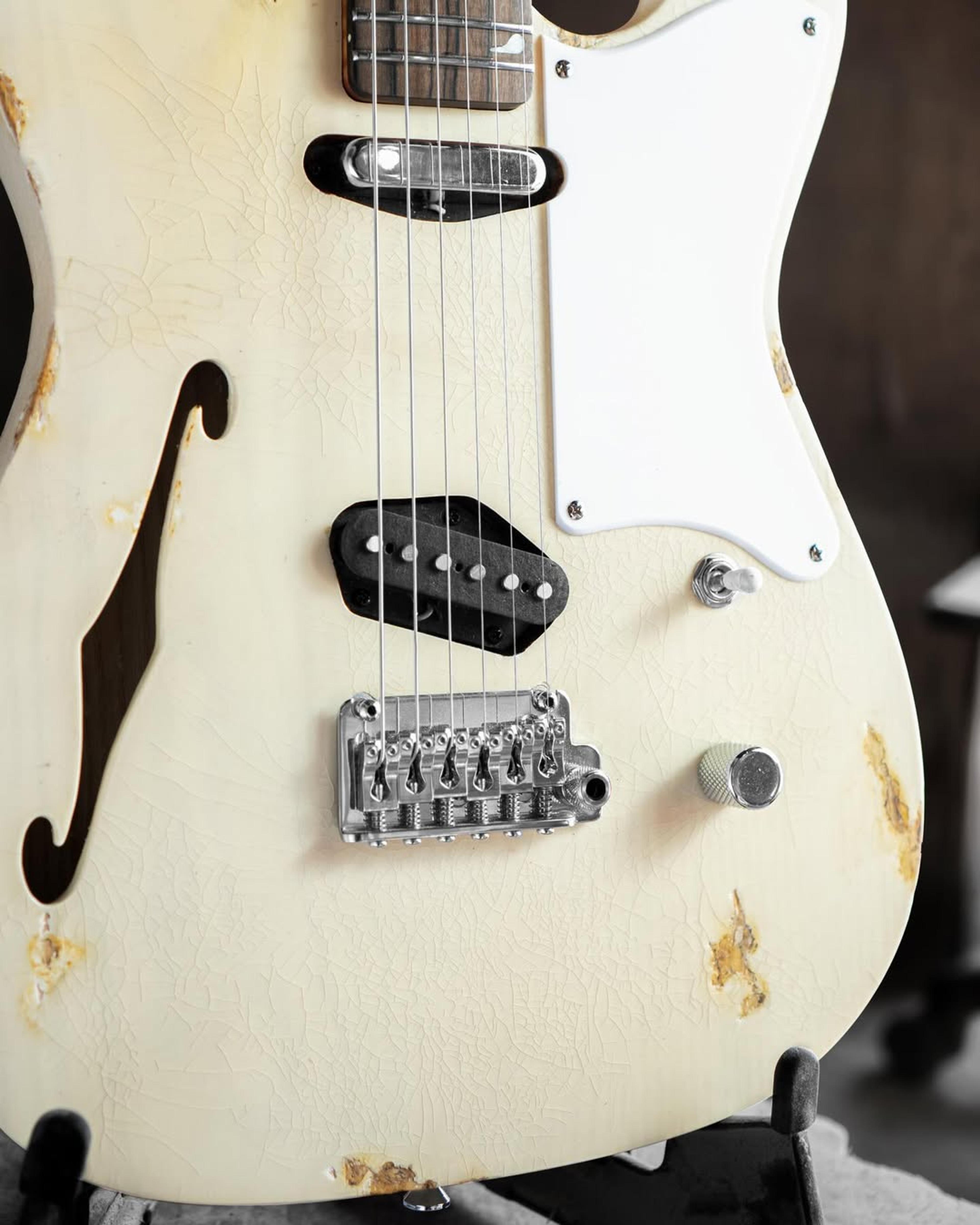Side Body view of the ODIENG Parama Guitar Aged Cream Relic 6 string Guitar