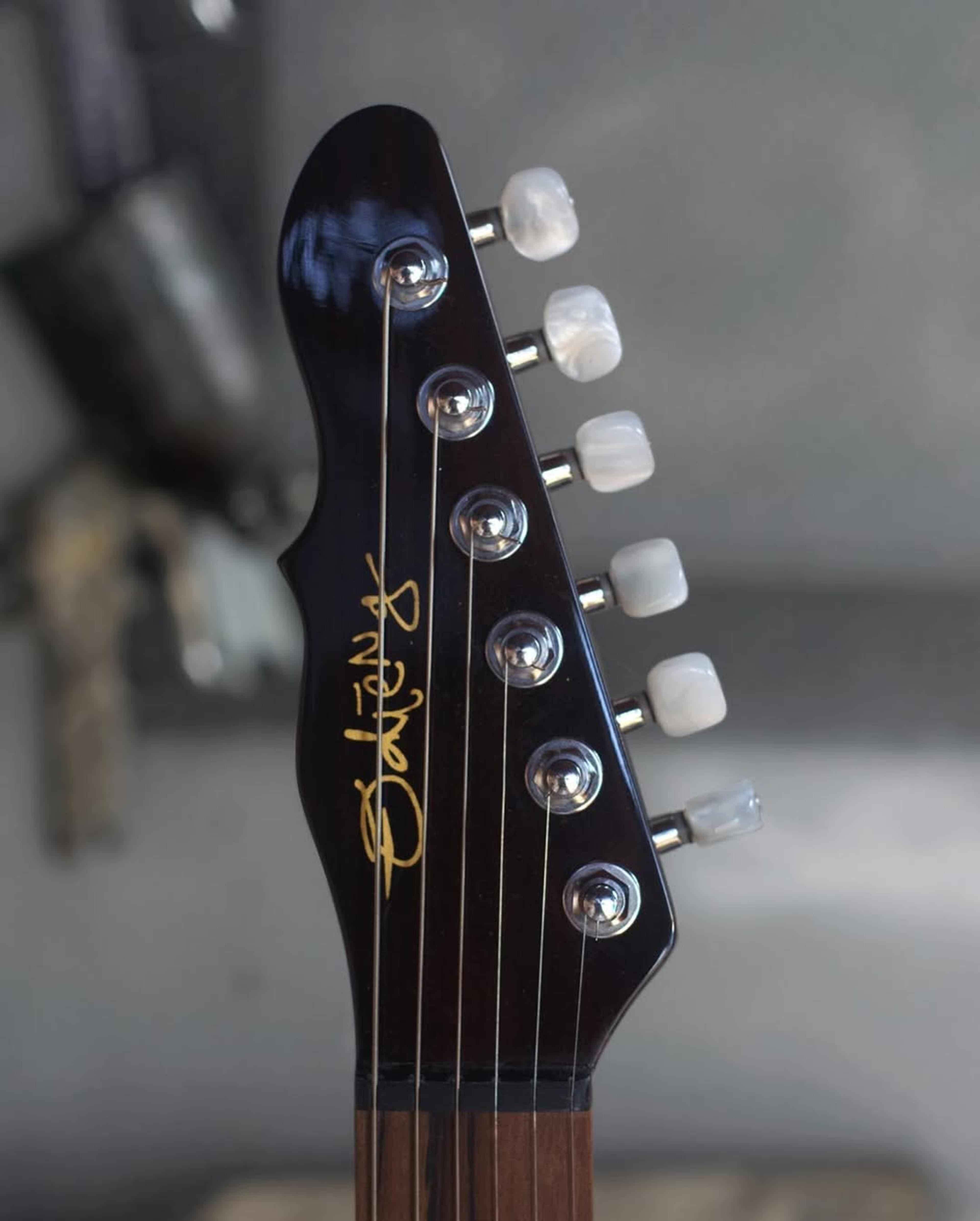 Front Headstock view of the ODIENG Series 5 6 string Guitar