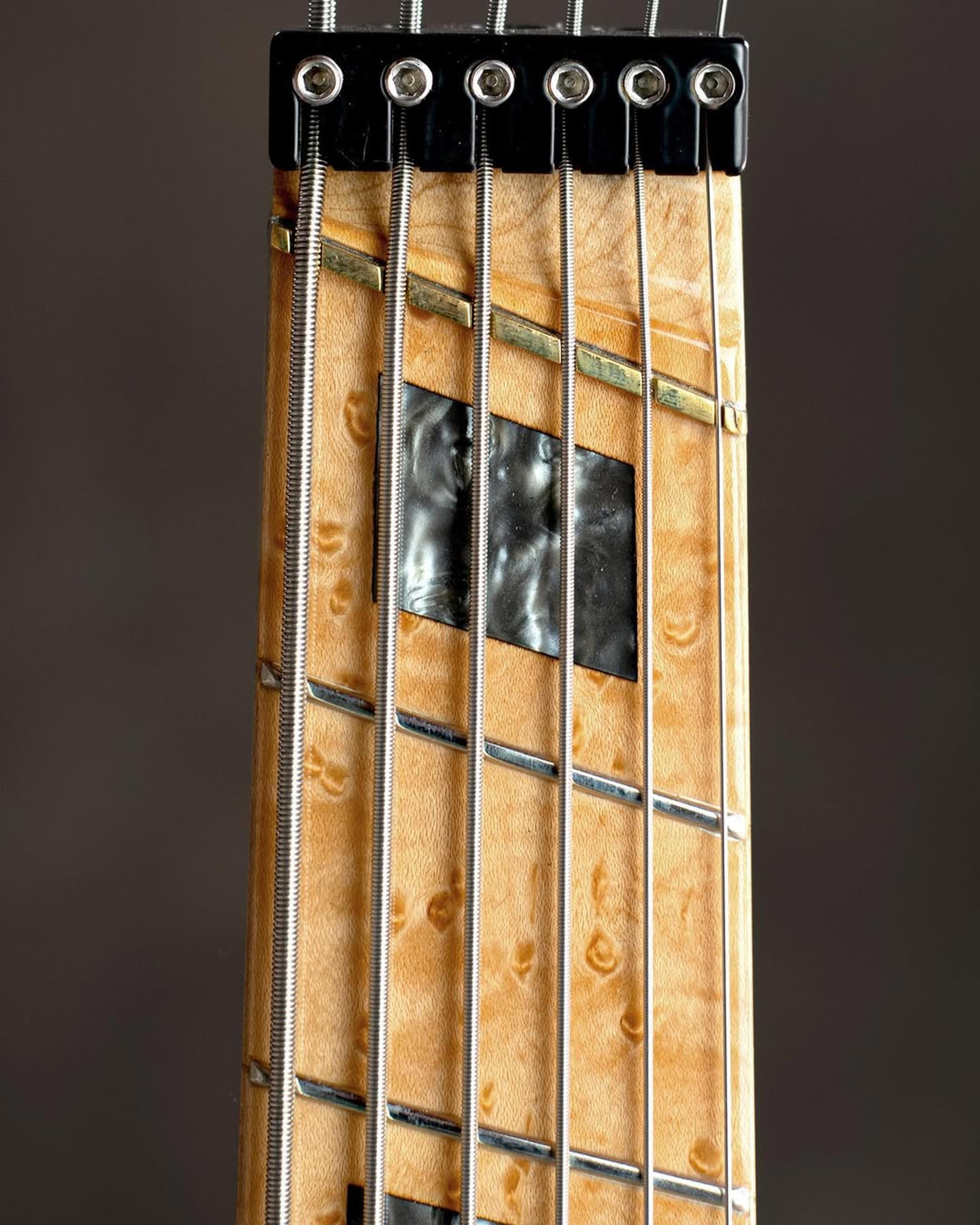 Front Headstock view of the ODIENG Nebula Headless 6 string bass