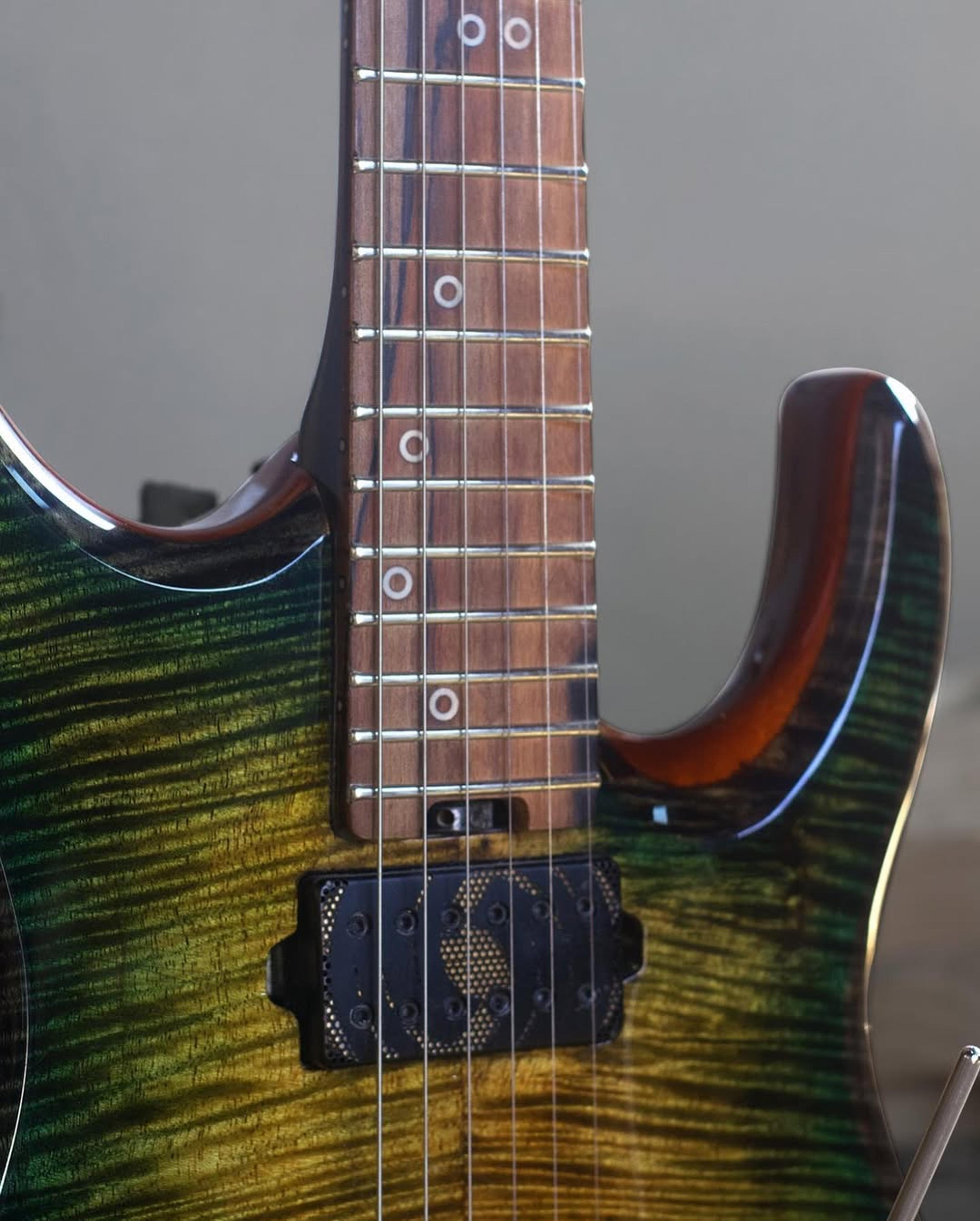 Front detail fretboard view of the ODIENG Series 5 6 string Guitar