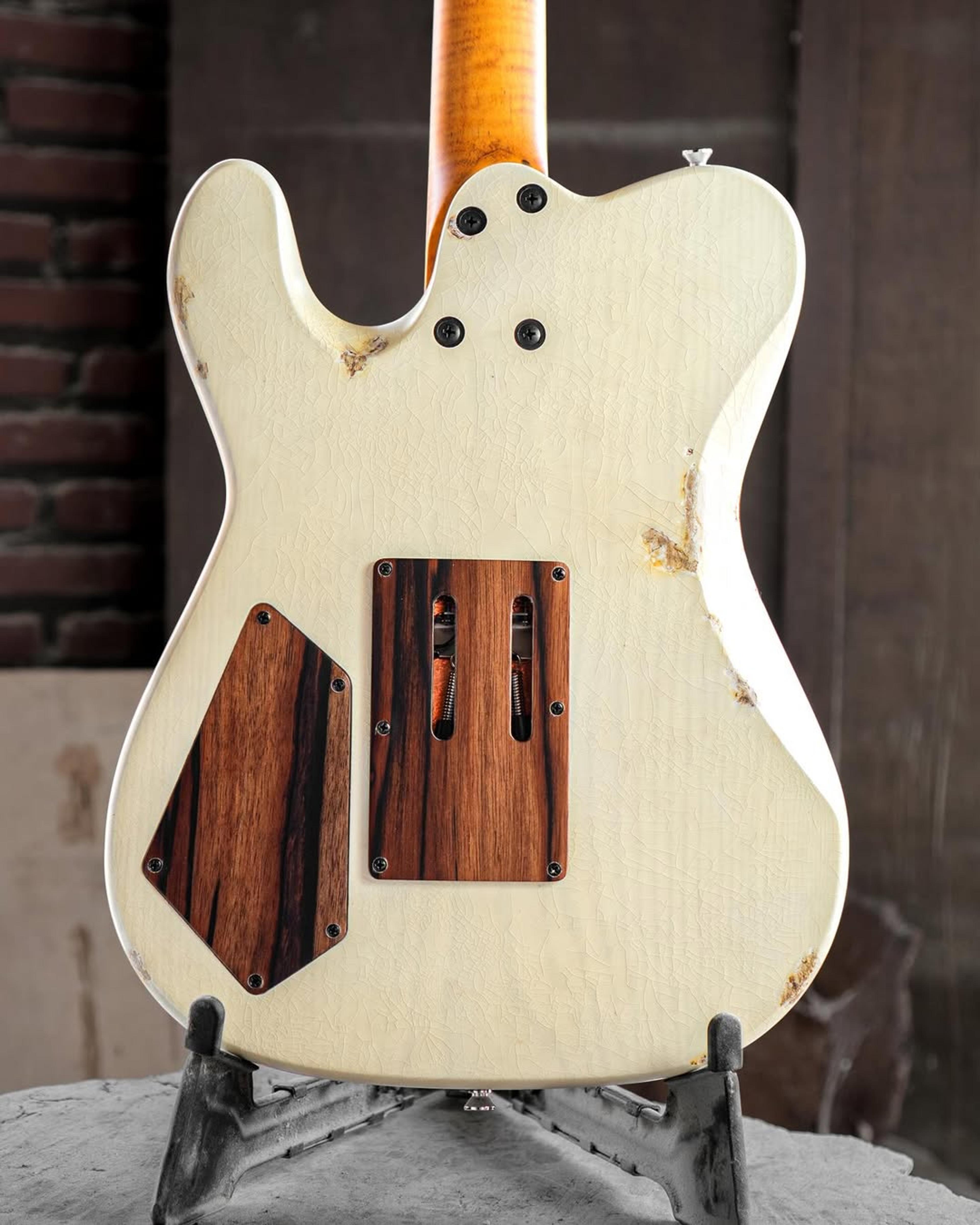 Back body view of the ODIENG Parama Guitar Aged Cream Relic 6 string Guitar