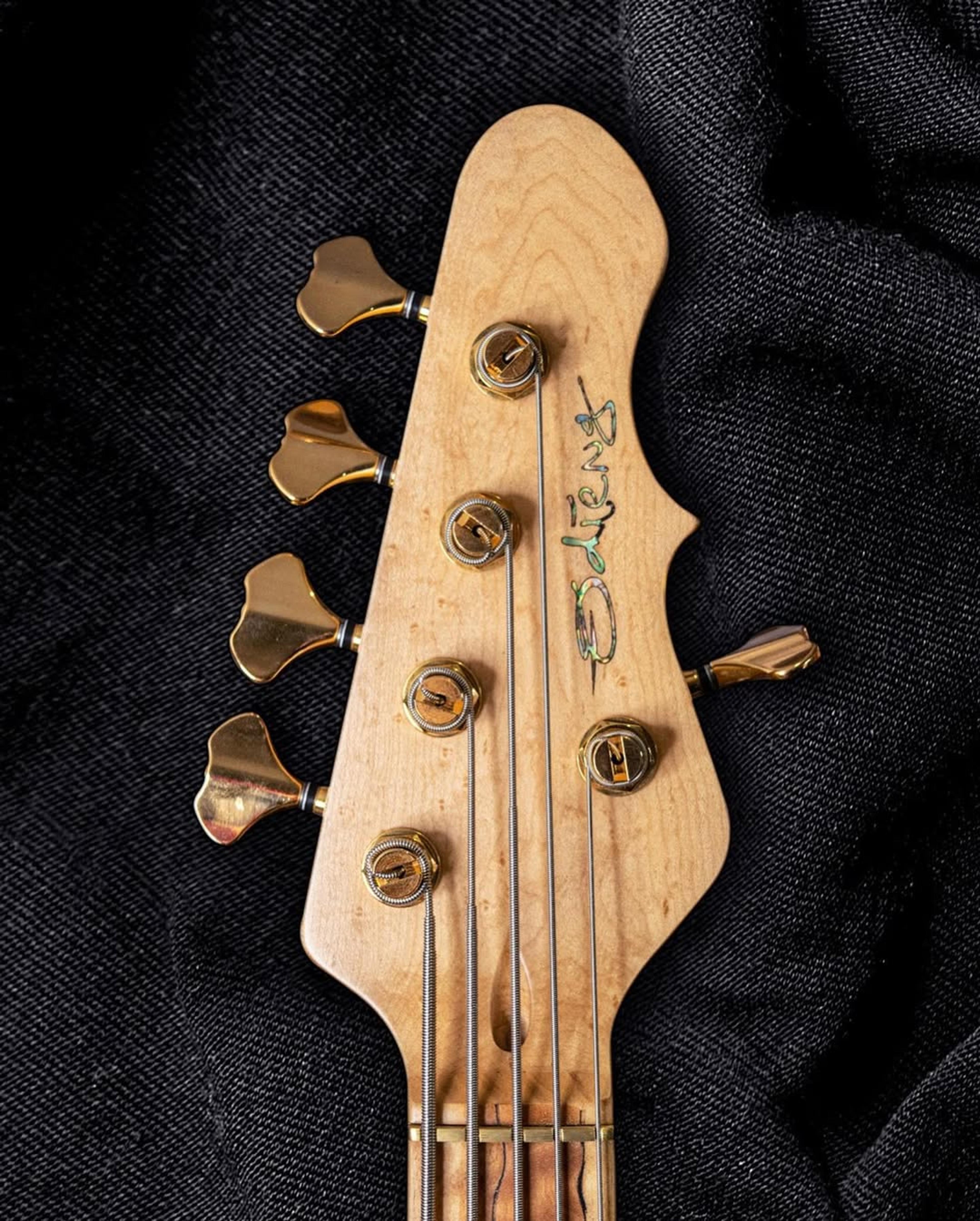Front Headstock view of the ODIENG Corvette 5 string bass