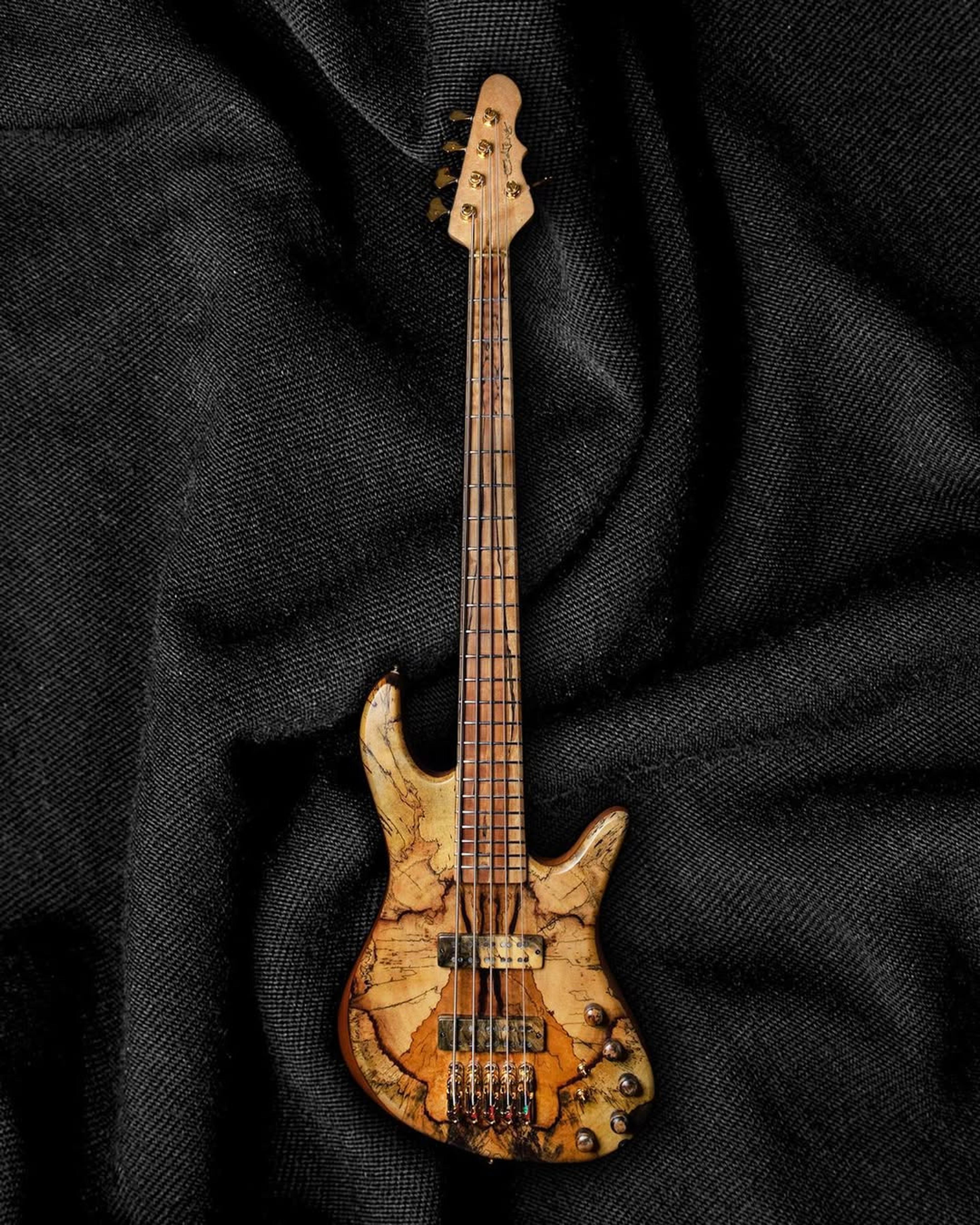 Full front view of the ODIENG Corvette 5 string bass