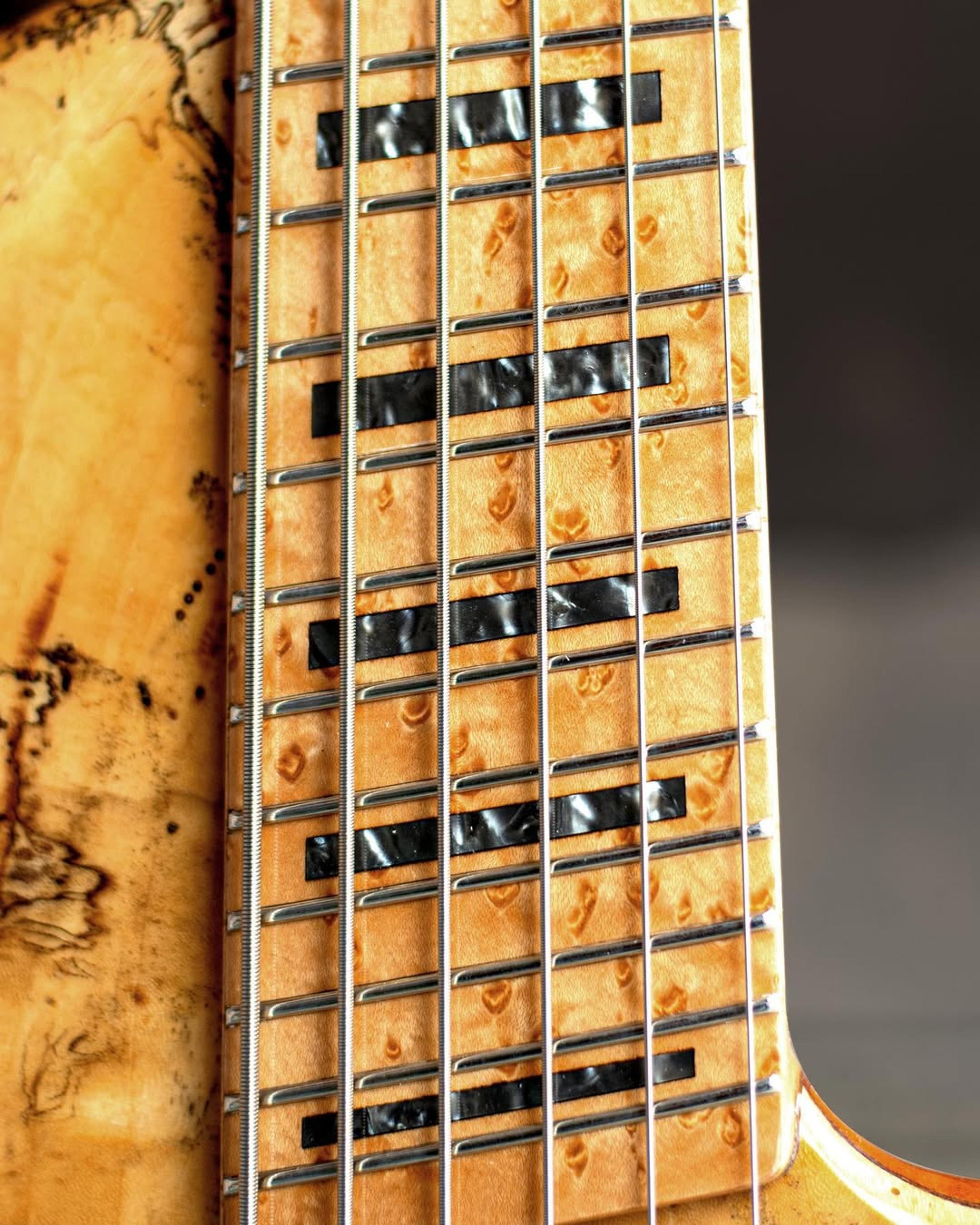Front detail fretboard view of the ODIENG Nebula Headless 6 string bass
