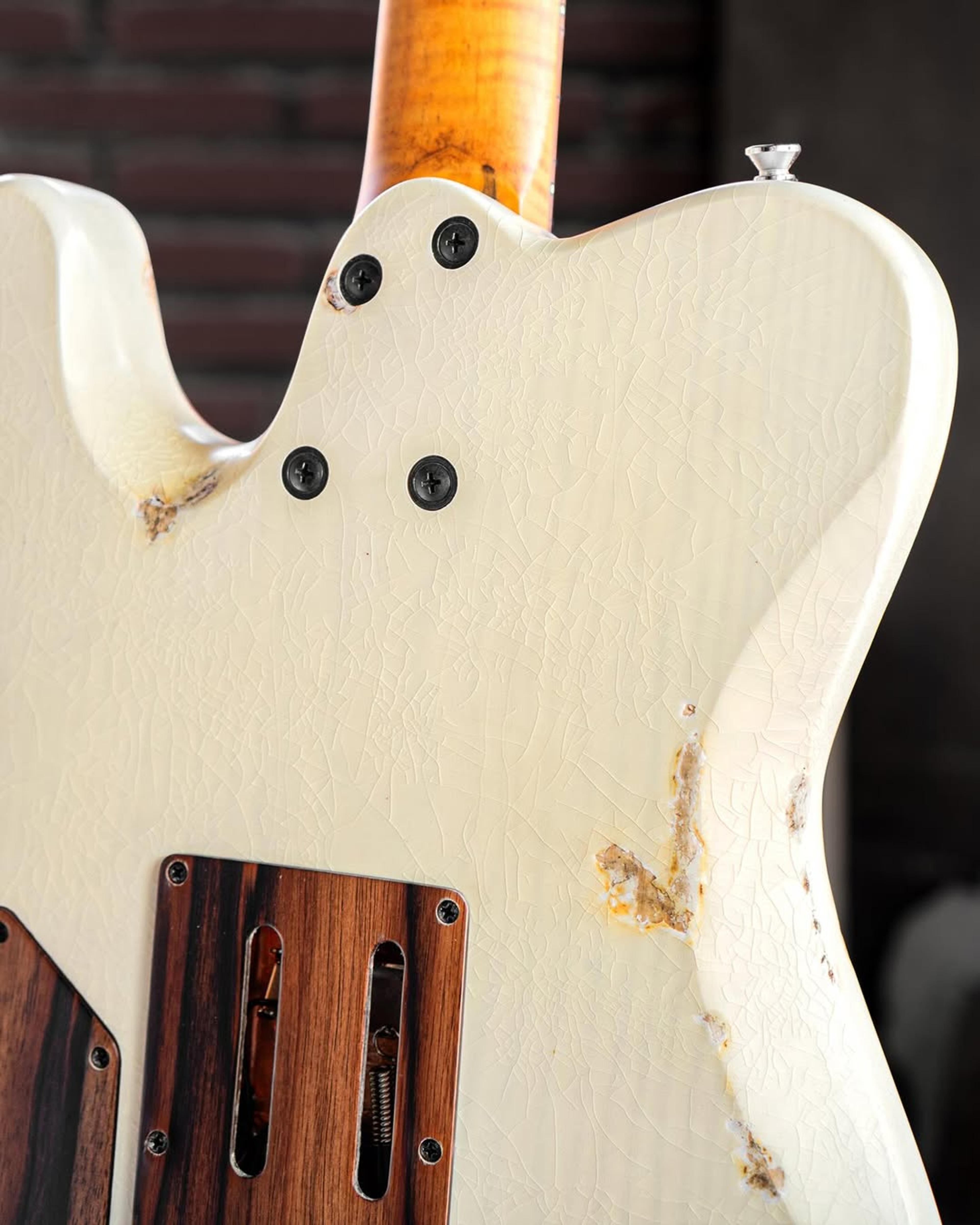 Back detail view of the ODIENG Parama Guitar Aged Cream Relic 6 string Guitar