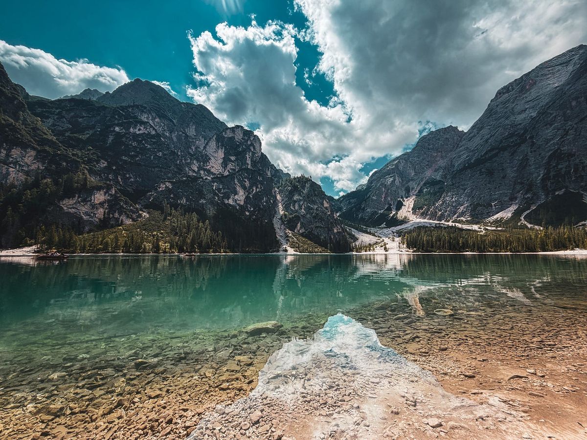 Lago di Braies shot from the eastern shoreline, July 2026