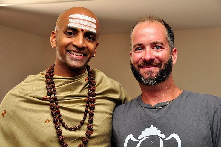 Jaxon and Dandapani pose for a photo.