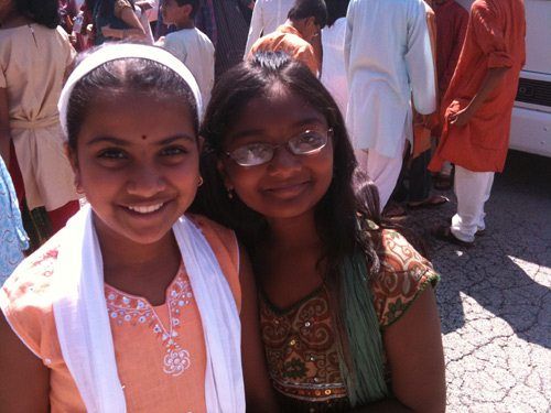 Everyone is dressed in beautiful Indian outfits and looking very elegant.