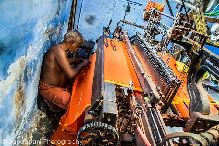 Some of us bought fabrics….you could not get any closer to the source than this. Here a weaver is cutting out a piece for one of our travelers.