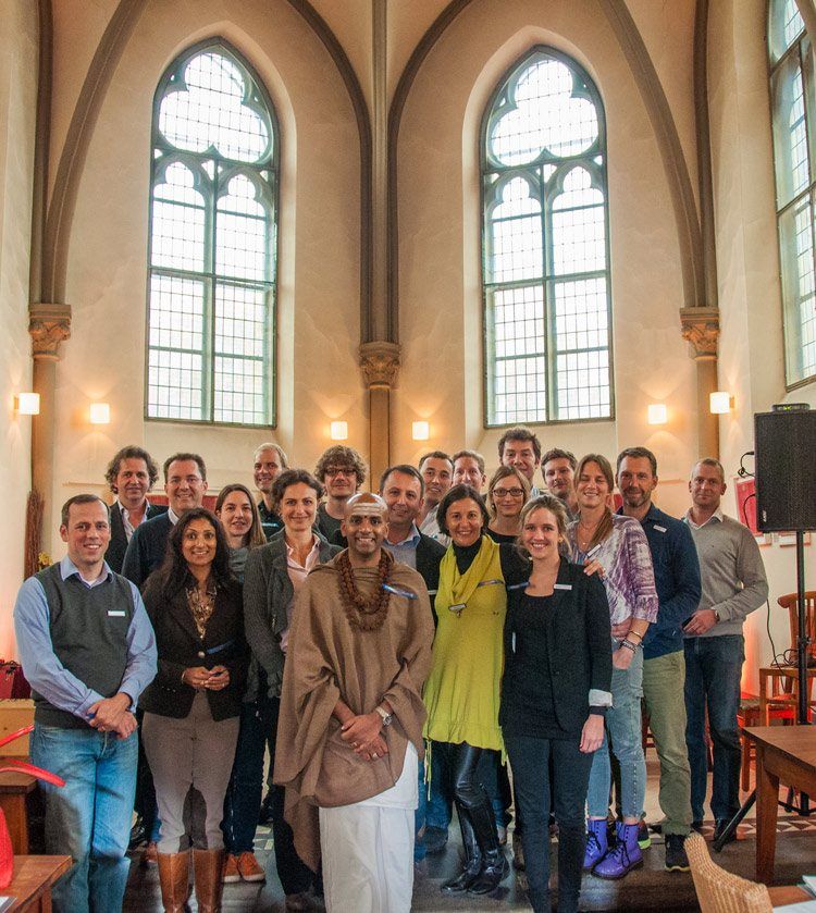 Most of the attendees of the workshop post for a group photo in the lovely little church.