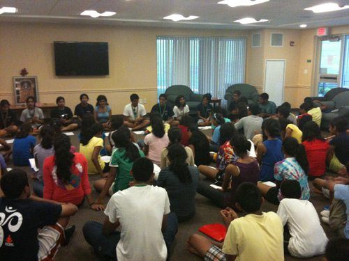 The first event of the camp is singing of bhajans. The older campers lead the younger ones in devotional songs.
