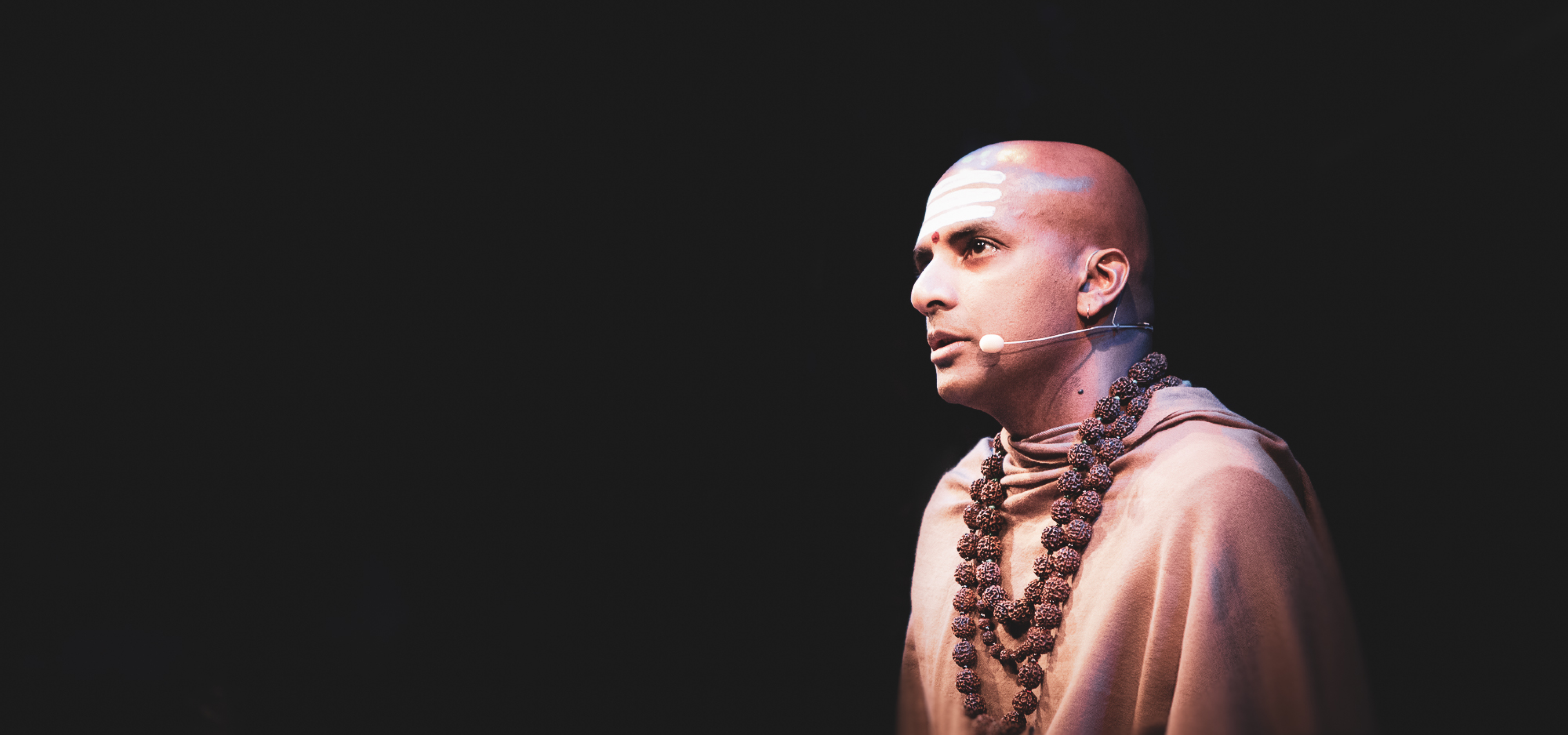 Dandapani speaking at an event