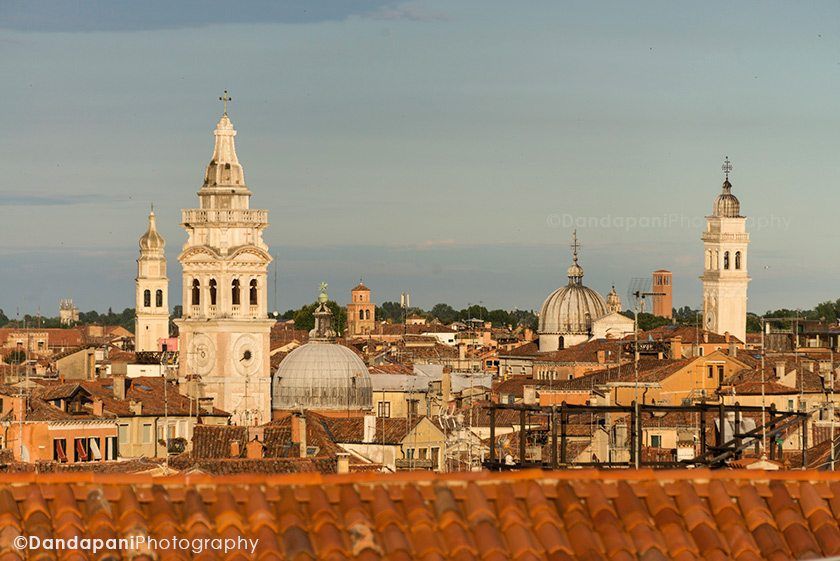 Venice skyline of rooftops, domes and steeples.