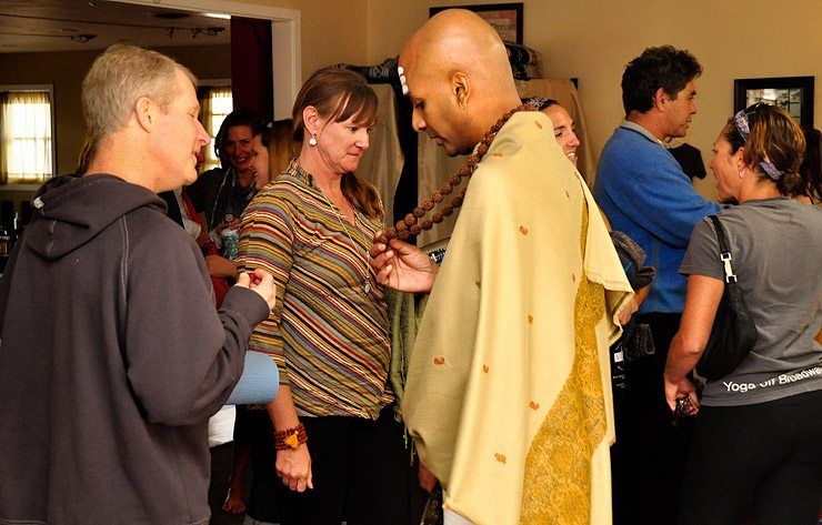 Dandapani shares with Ted a little about the rudraksha mala (necklace) he is wearing.