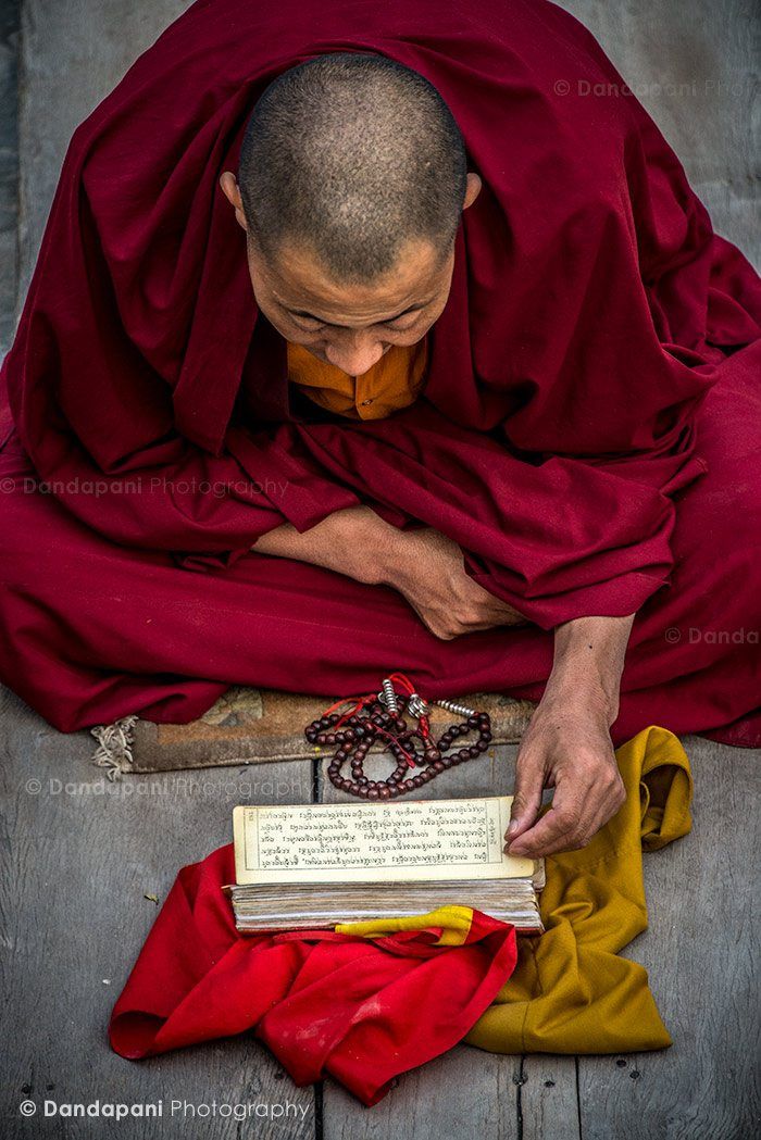 buddhist-monk-praying-nepal-kathmandu