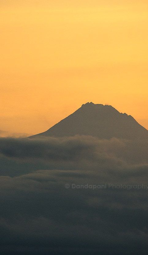 The sunrises behind the mighty Gunung Merapi. Still very active this volcano caused massive destruction in 2010.