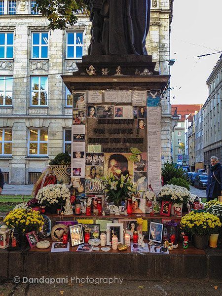 The shrine to Michael Jackson is canvassed with photos, flowers and candles.
