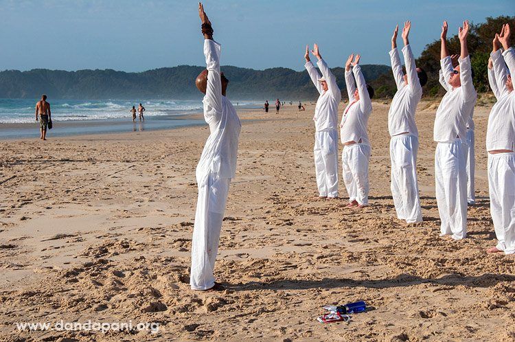 Taking everyone through a few rounds of sun salutations.