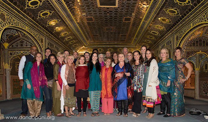 We pose for a group photo in one of the intricately designed rooms.