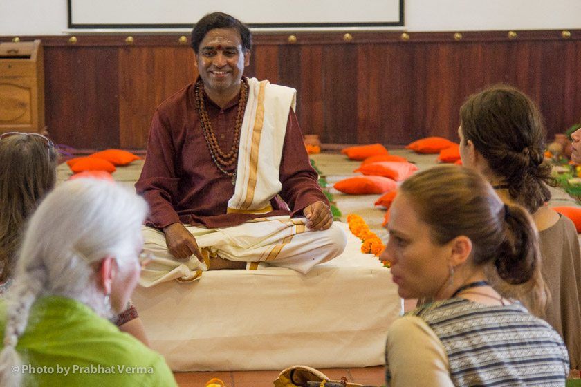 Sri Janahan teaches his class on worship (the power of devotion), Sanskrit chanting and pranayama (breath control).
