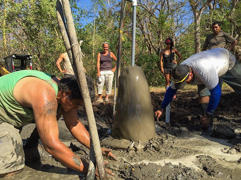 First gush of water filled with silt.