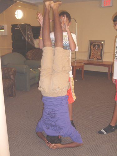Head stand during the morning hatha yoga session that begins at 6:45am