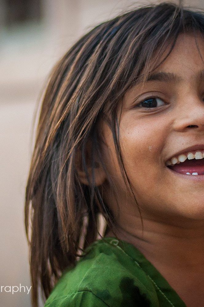 young indian girl child laughing smiling