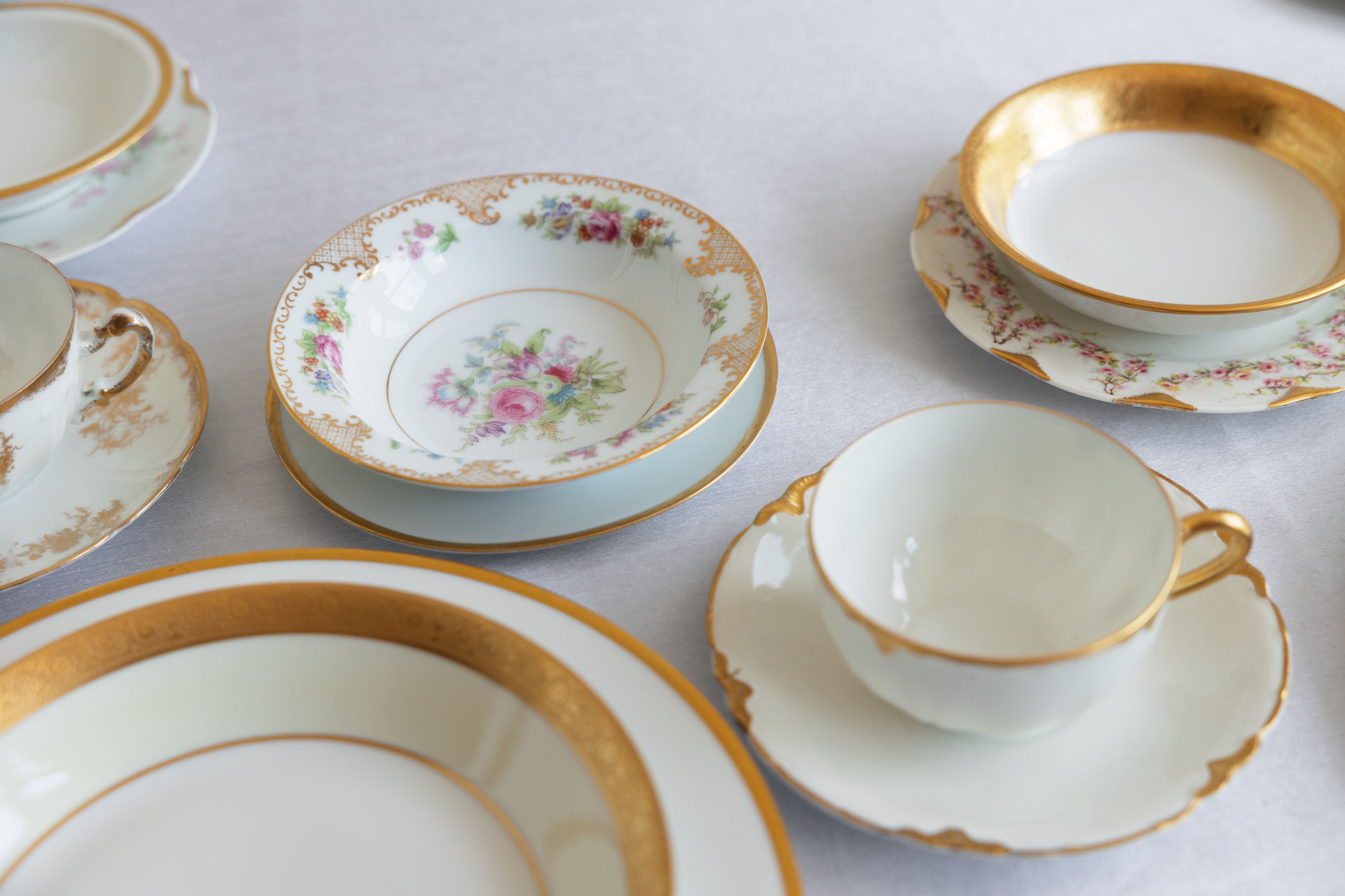 Celebration tablescape with mismatched vintage plates