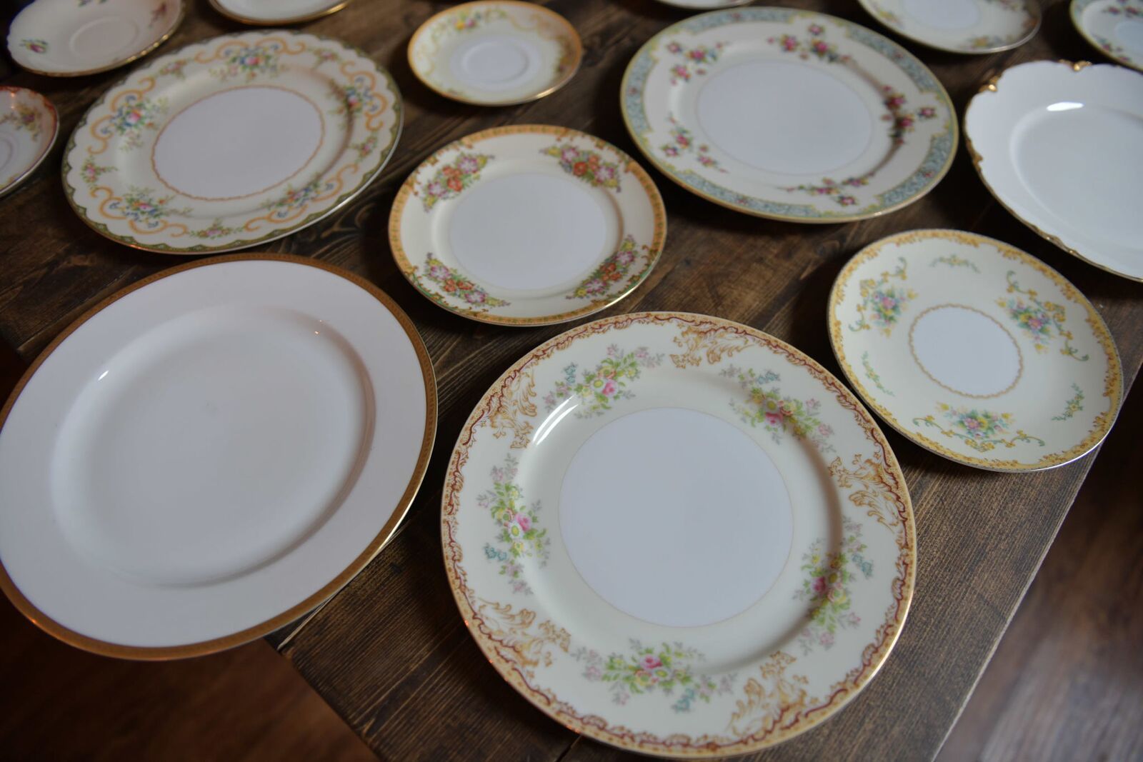 Vintage dessert and teacup collection display