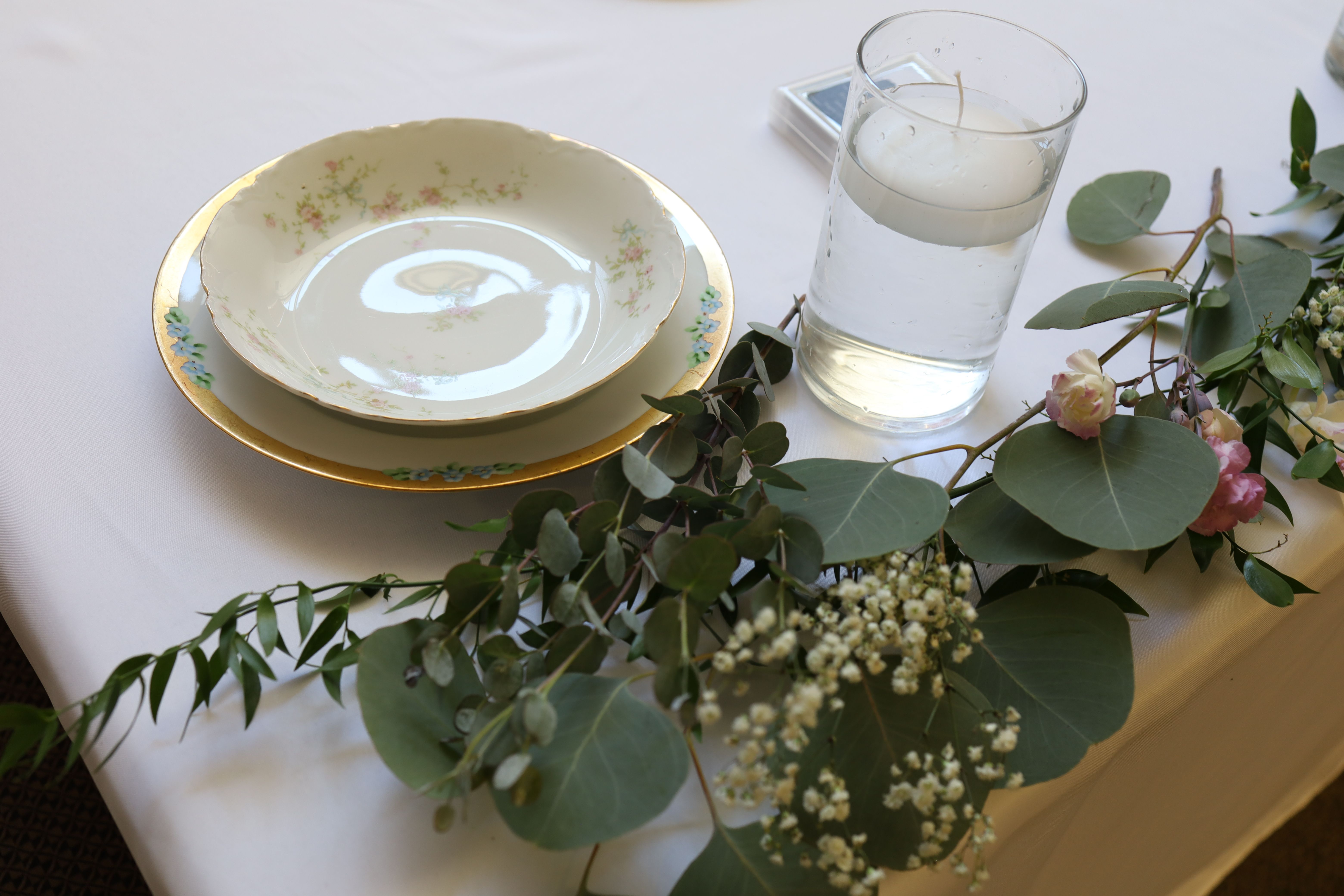 Wedding reception tablescape with vintage china