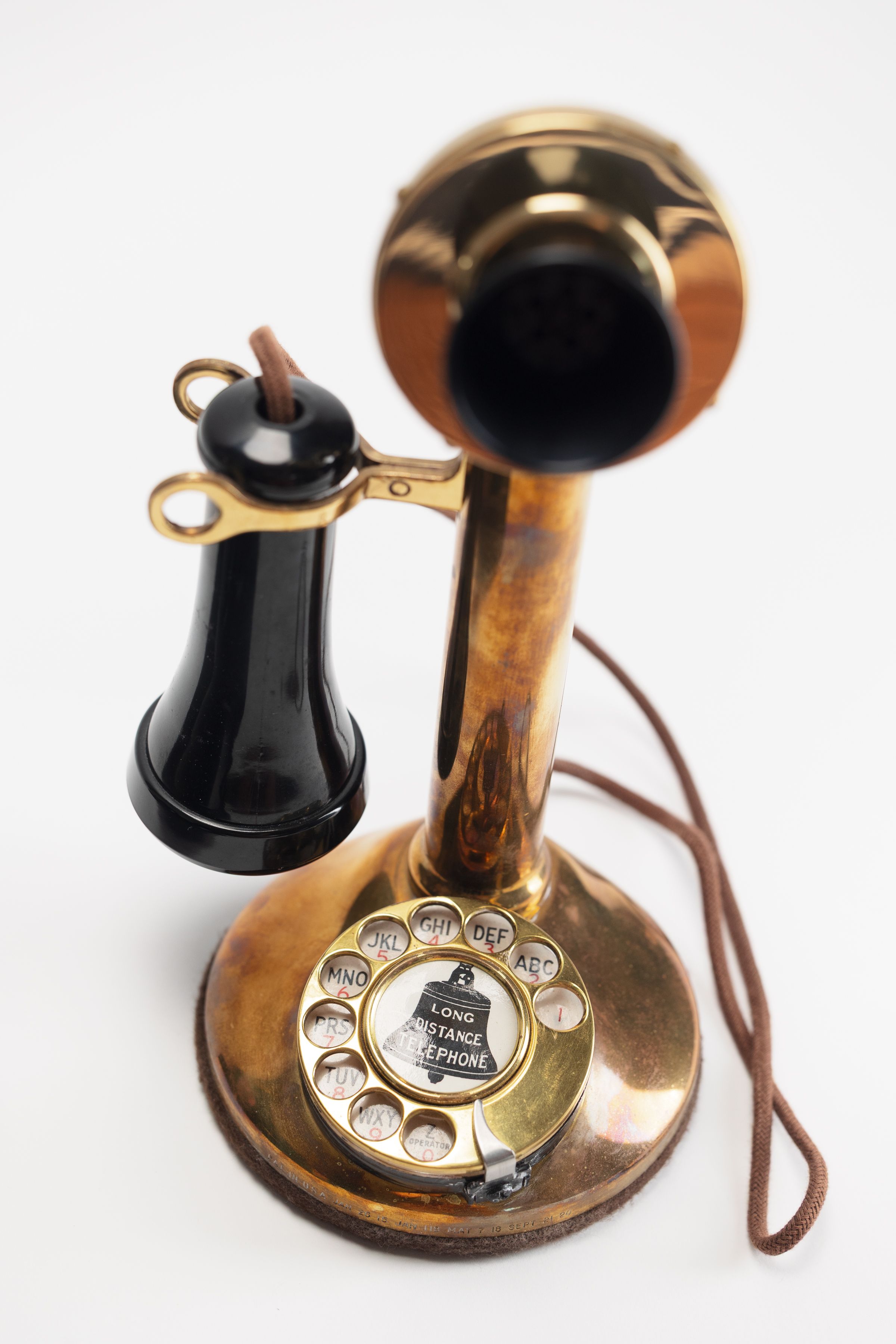 Antique brass candlestick rotary telephone prop