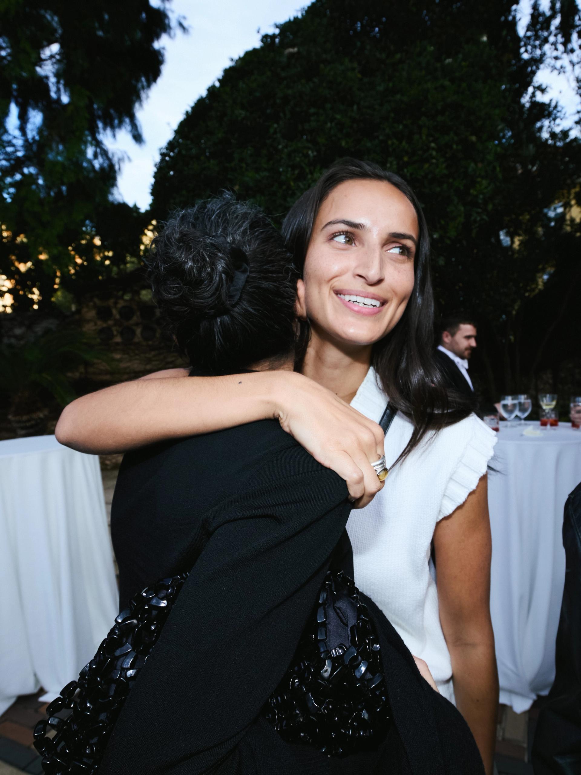 Bella Thomas and Chesca Athas attend P. Johnson’s spring season celebration