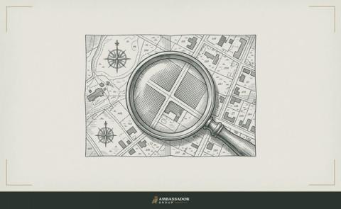 Antique engraving illustration. A brass magnifying glass resting atop a densely annotated survey map, its lens positioned over a precise grid intersection, suggesting evidence illuminated by scrutiny.