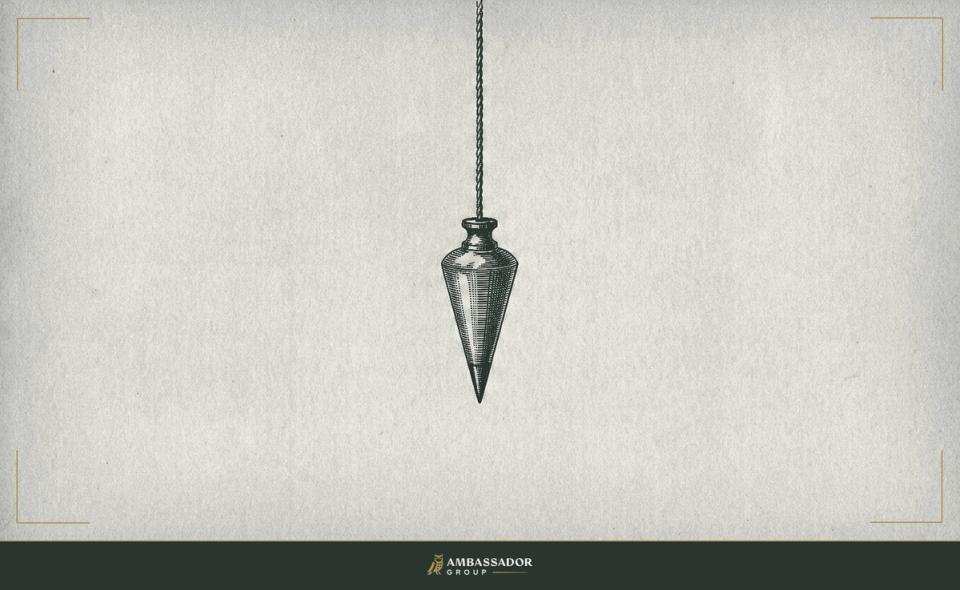Antique engraving illustration. A carpenter’s plumb bob hangs still from a fine cord, finding true vertical.