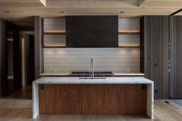 Walnut kitchen island with stone counter