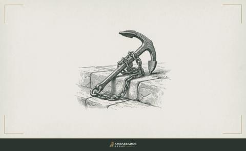 Antique engraving illustration. A forged iron anchor with coiled chain resting on a stone quay.