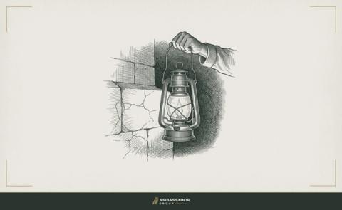Antique engraving illustration. A hand-held lantern with its flame burning clear, held out toward the viewer, illuminating a cracked foundation wall just visible in the shadows behind it.