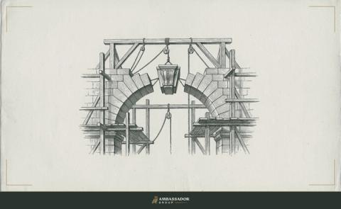 Antique engraving illustration. A load-bearing keystone hanging in mid-arch, its adjoining voussoirs unset, the surrounding scaffolding still in place as the structure waits for its owner to close the gap.