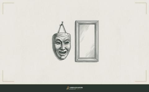 Antique engraving illustration. A theater mask hanging from a hook beside a plain mirror, the reflection showing only the bare wall behind the mask.