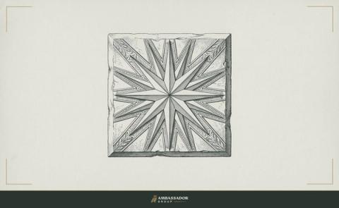 Antique engraving illustration. A many-pointed star compass rosette carved into a cornerstone block, its rays radiating outward to guide the walls raised above it, an ornamental motif with no letters or numerals.
