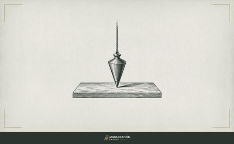 Antique engraving illustration. A plumb bob suspended from a cord, its pointed tip hovering just above a flat wooden board.